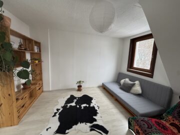 Wohnbereich im Obergeschoss - Garten. Berge. Freiheit.