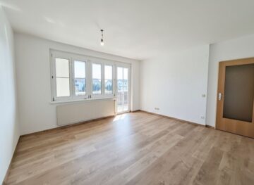 Wohnzimmer - Geförderter Familientraum