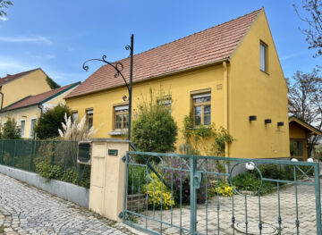 Bild - Wohnen und Heuriger vereint